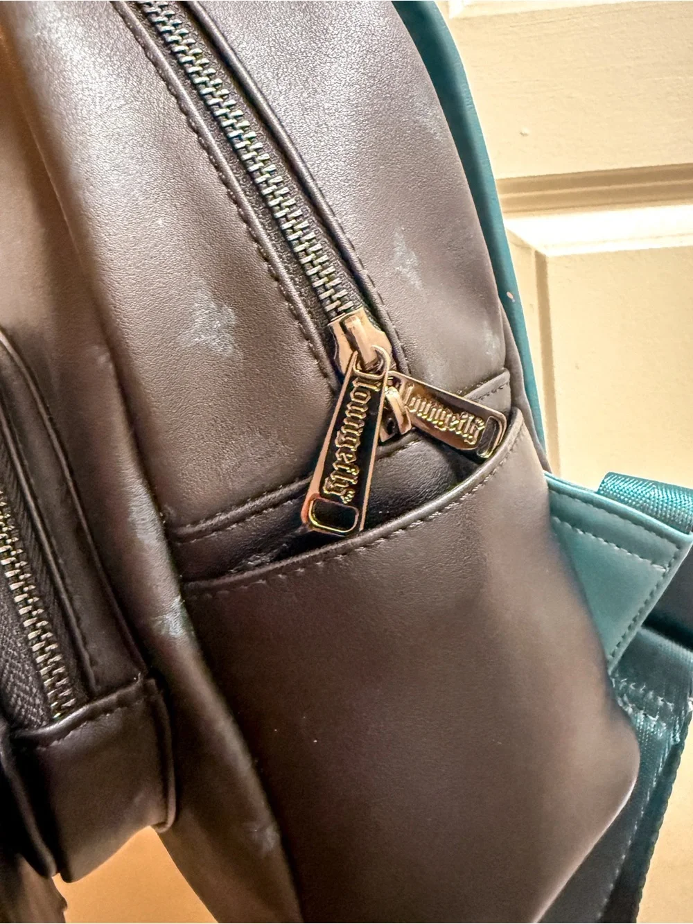 Loungefly Haunted Mansion Mini Backpack in Black & Teal Accents